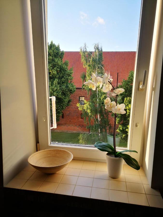 Legata Apartment Ostroda Bagian luar foto